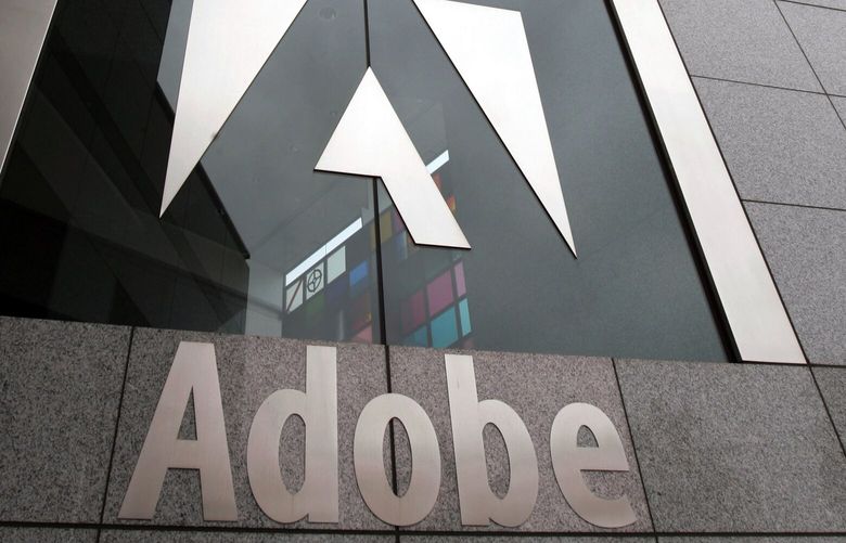  This Dec. 13, 2006 file photo shows an exterior view of the Adobe headquarters in San Jose, Calif. (AP Photo/Paul Sakuma) 