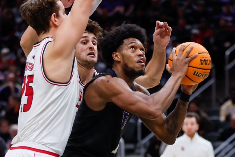 Huskies forward Keion Brooks Jr. looks for room to lay the ball up against Seattle U during the first half Sunday in Seattle. (Jennifer Buchanan / The Seattle Times)