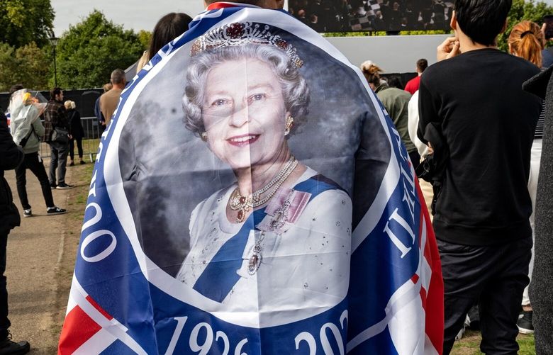A crown branded onto bodies links British monarchy to slave trade