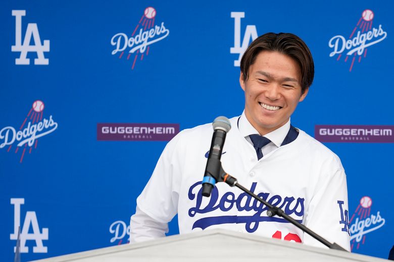 Yoshinobu Yamamoto joins the Los Angeles Dodgers, vows to compete for championships alongside Ohtani | The Seattle Times