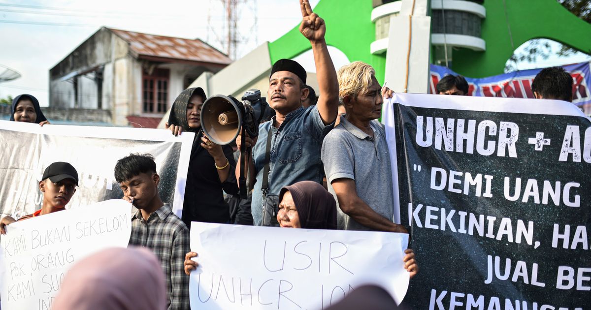 Hundreds of residents on Indonesian island protest the growing arrival ...