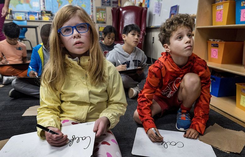 Third graders learn cursive at Laurel School Upper Campus in Menlo Park on Dec. 20, 2023. A law taking effect in 2024 will require cursive instruction. (Karl Mondon/Bay Area News Group/TNS)