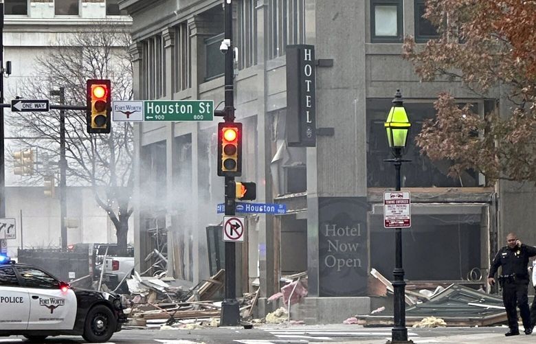 First responders work the scene after an explosion at the Sandman Signature hotel on Monday, Jan. 8, 2024, in Fort Worth, Texas. (Cameron Arnold via AP) TXHO101 TXHO101
