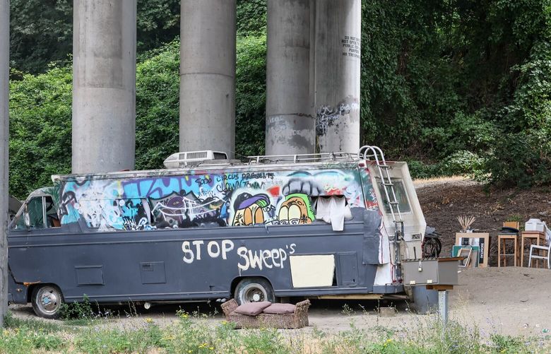 A growing encampment Friday afternoon at the intersection of Airport Way South and South Snoqualmie Street under I-5 in Seattle, Washington on August 18, 2023.