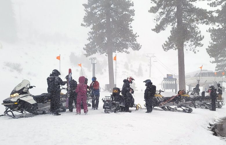Rescues crews work at the scene of an avalanche at a California ski resort near Lake Tahoe on Wednesday, Jan. 10, 2024 in Calif. The avalanche roared through a section of expert trails at the ski resort, killing one person and injuring another, as a major storm with snow and gusty winds moved into the region, authorities said. (Mark Sponsler via AP) LA305
