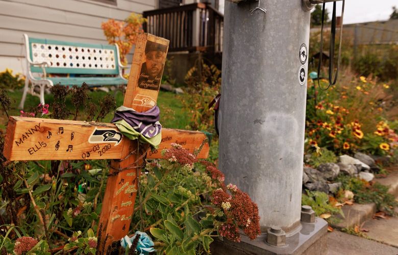 A memorial for Manuel Ellis is seen on Monday, Nov. 7, 2022 on South 96th Street and Ainsworth Avenue South in Tacoma, Wash.
 222107