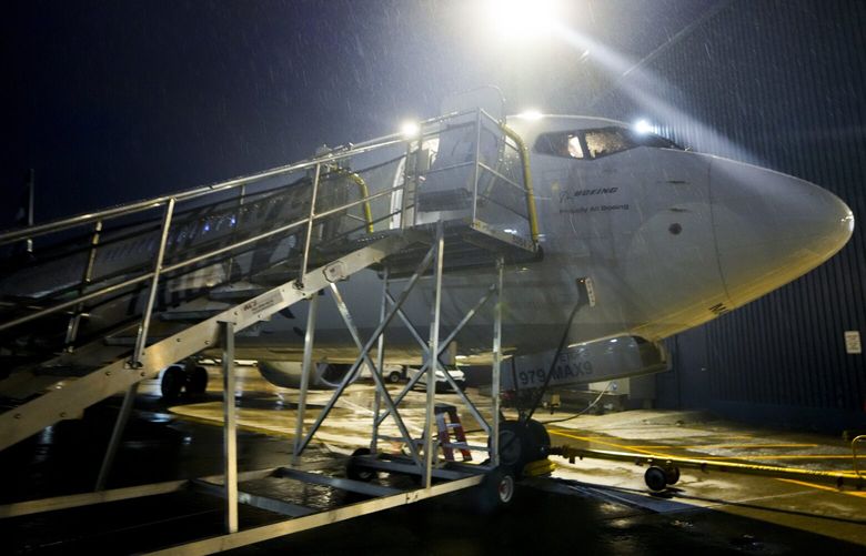 File – An Alaska Airlines Boeing 737 Max 9 aircraft awaits inspection outside the airline’s hangar at Seattle-Tacoma International Airport Wednesday, Jan. 10, 2024, in SeaTac, Wash. The Federal Aviation Administration says it will audit Boeing’s aircraft production and increase oversight of the troubled company after a panel blew off a jetliner in midflight last week. (AP Photo/Lindsey Wasson, File) NYPM504 NYPM504