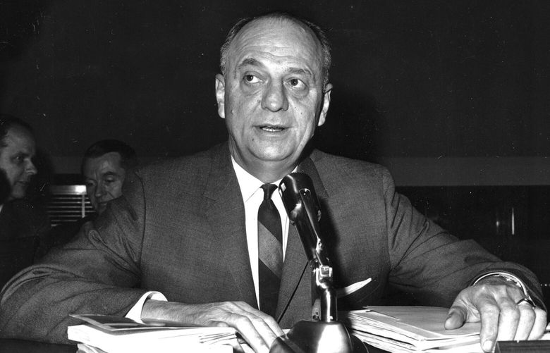 FILE – In this April 9, 1965 file photo, Surgeon General Luther Terry testifies on Capitol Hill in Washington before the House Commerce Committee hearing on proposed labeling of cigarette packages. Sixty years ago, the U.S. surgeon general released a report that settled a longstanding public debate about the dangers of cigarettes and led to huge changes in smoking in America. Some public health experts say a similar report could help clear the air about vaping. (AP Photo/File) NY429 NY429