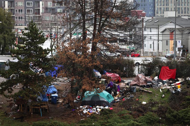The U.S. Supreme Court will hear a landmark homelessness case that has helped to establish some basic protections for people living outside. Currently, cities like Seattle have to offer people living outside a form of shelter before clearing their encampment, but that could go away. (Karen Ducey / The Seattle Times)