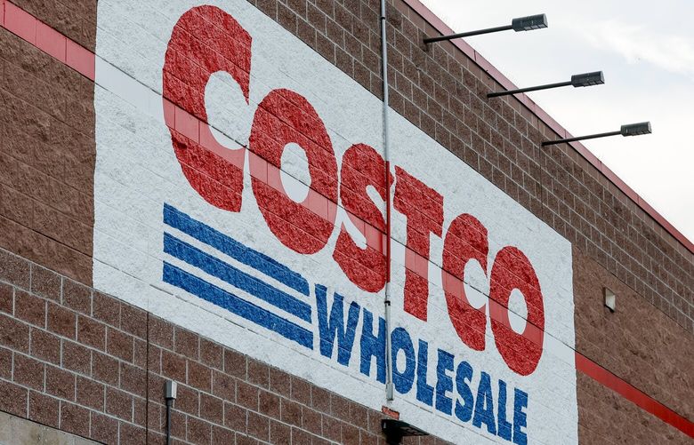 A painted sign adorns the side of a Costco Wholesale on Oct. 31, 2023 in Shoreline, Wash. 225335