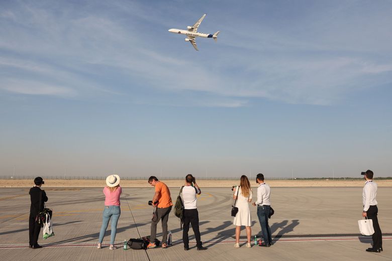 Attendees photograph an Airbus A350-1000 passenger jet at the Dubai Air Show in the United Arab Emirates in November. Delta Air Lines ordered 20 of these jets this month, a substantial win for Airbus. (Christopher Pike / Bloomberg)