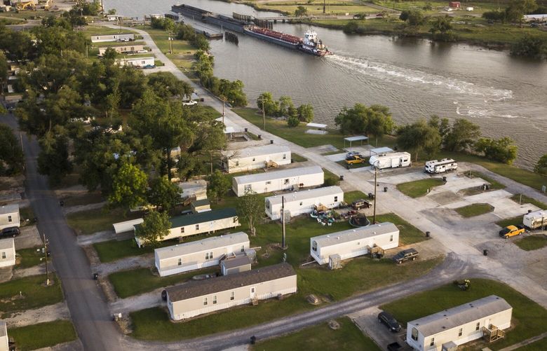 FILE – Trailers provided by the Federal Emergency Management Agency (FEMA) near Grand Lake, La., after Hurricane Laura and Hurricane Delta, on June 15, 2022. The Biden administration is overhauling the country’s disaster assistance programs, expanding aid for survivors of hurricanes, wildfires and other catastrophes and making it easier to access. (Edmund D. Fountain/The New York Times) XNYT0491 XNYT0491