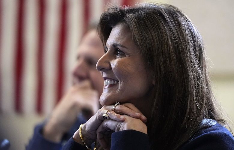 Republican presidential candidate former UN Ambassador Nikki Haley listens to students during a campaign stop at the Polaris Charter School, Friday, Jan. 19, 2024, in Manchester, N.H. (AP Photo/Charles Krupa) NHCK112 NHCK112