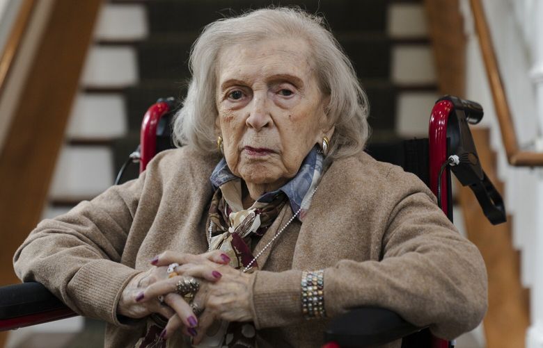 Boston Post Cane recipient Marion Cronin at her nursing home in Rye, Maine on Dec. 29, 2023. Cronin, 102, attributed her long life to positivity, and “saying yes to everything.” (Sophie Park/The New York Times)