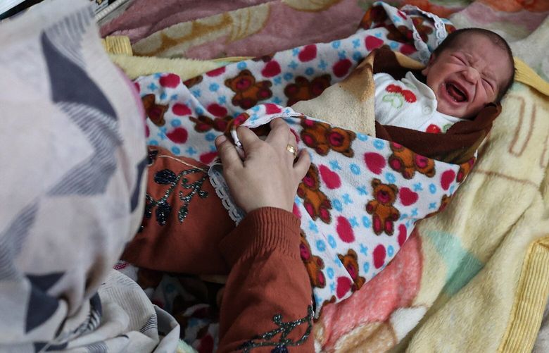 The baby Ramzy, 5 days old. MUST CREDIT: Loay Ayyoub for The Washington Post
