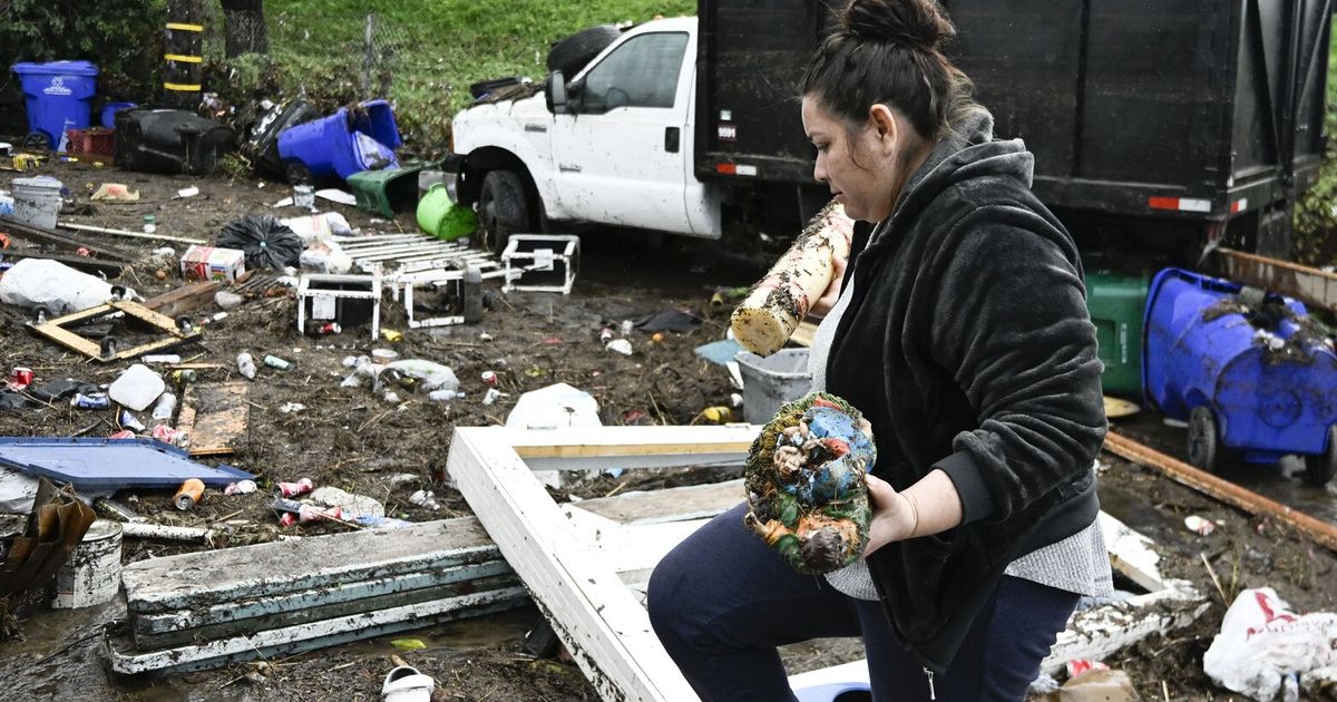 San Diegans cry, hug outside damaged homes after stunning flash floods in ...