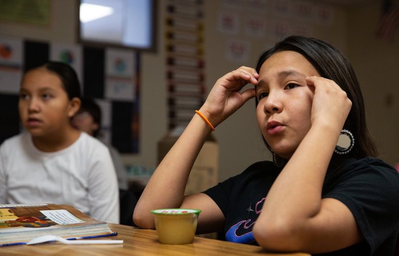 Chaselyn White Man repeats Blackfoot vocabulary words during class at Napi Elementary School in Browning. MUST CREDIT: Holly Pickett for The Washington Post
