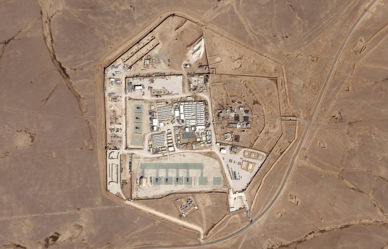 This satellite photo from Planet Labs PBC shows a military base known as Tower 22 in northeastern Jordan, on Oct. 12, 2023. Three American troops were killed and “many” were wounded Sunday, Jan. 28, 2024, in a drone strike in northeast Jordan near the Syrian border, President Joe Biden said. He blamed Iran-backed militia groups for the first U.S. fatalities after months of strikes against American forces across the Middle East amid the Israel-Hamas war. U.S. officials identified Tower 22 as the site of the attack. (Planet Labs PBC via AP) ARE101 ARE101