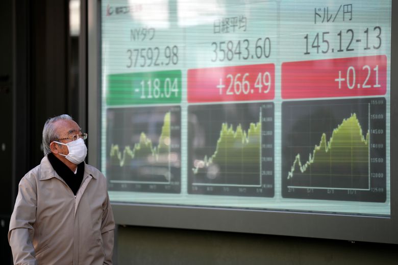 Stock market today: Shares fall in Europe after gains in Asia. US markets  are closed for a holiday | The Seattle Times