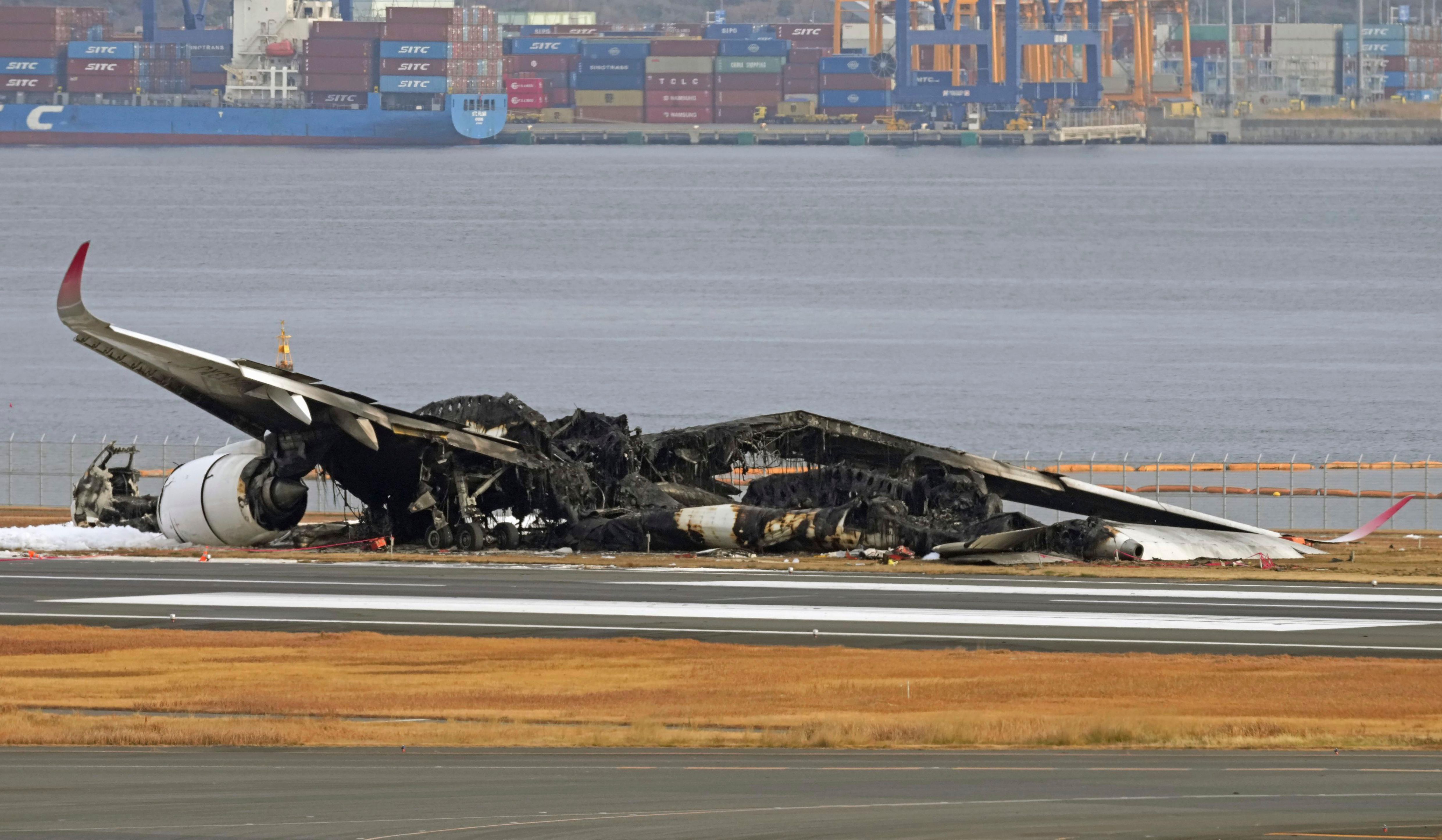 Planes collide and catch fire at Japan's busy Haneda airport