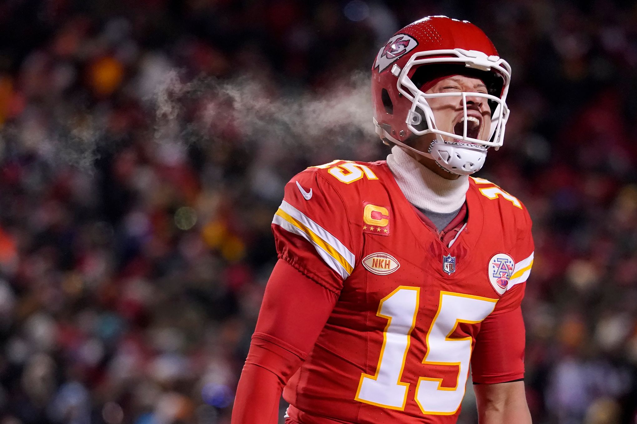 Patrick Mahomes leads Chiefs to 26-7 playoff win over Miami in near-record low temps | The Seattle Times