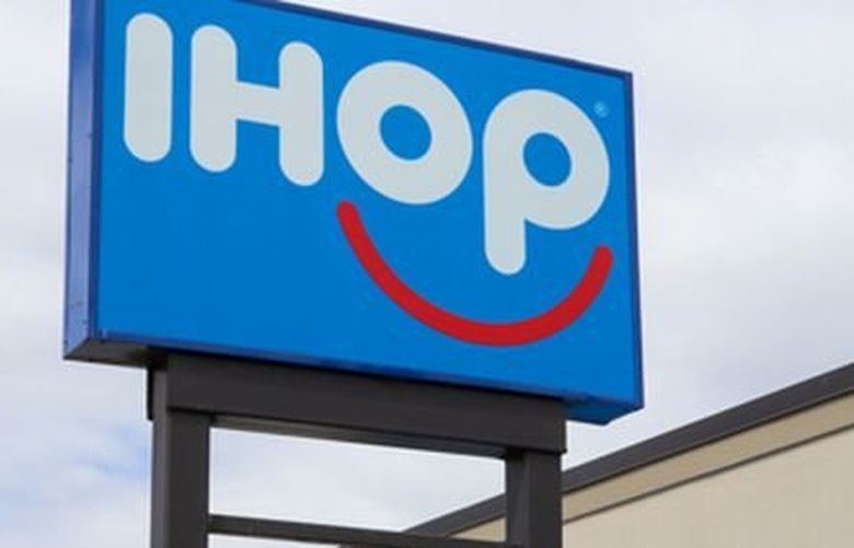 Authorities respond to a crash Friday, April 2, 2021, at IHOP, 1313 Route 22 West in Greenwich Township, where a driver hopped the curb and went through a wall. Two patrons seated inside complained of pain and minor injuries, and one was taken by ambulance to the hospital. 12766702P