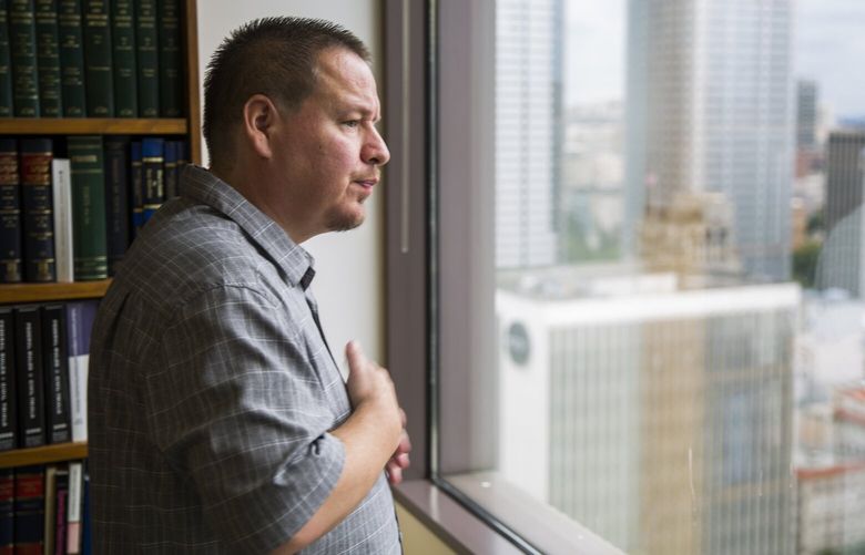 Ted Bradford looks out the window of his civil attorney’s office on Thursday, July 27, 2017 in downtown. 202944