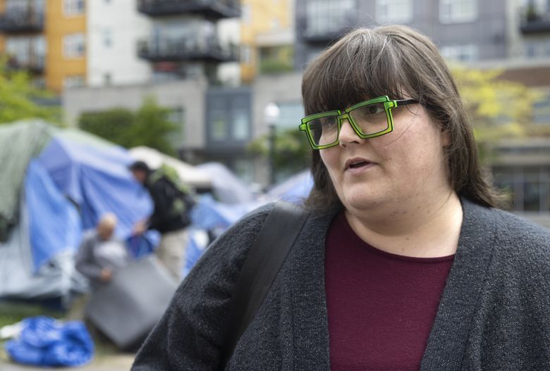 Former City Councilmember Cydney Moore has been a vocal advocate for Burien to accept King County’s $1 million to offer unsheltered people a tiny house village to live in. She later helped to launch a sanctioned tent encampment in Burien that lasted for three months. (Ellen M. Banner / The Seattle Times)
