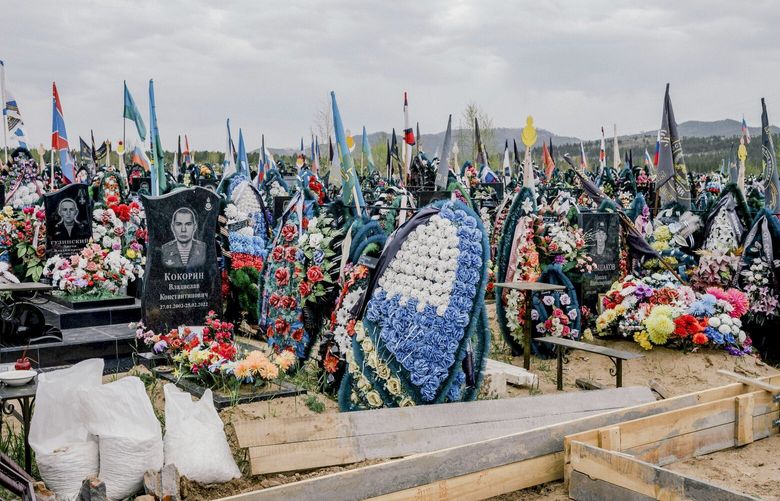 FILE — A cemetery in Ulan-Ude, Russia, where an entire section has been designated for casualties from the war, on May 30, 2023. The Russian government has been paying local military recruits about $2,500 a month, a huge sum in a region where a monthly salary of $500 is more typical. (Nanna Heitmann/The New York Times) XNYT0759 XNYT0759