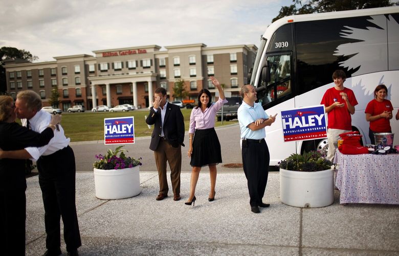 FILE — Nikki Haley, and Major Haley, to her left in a blue polo shirt, during her 2010 run for governor of South Carolina. at the Beaufort Town Center in Beaufort, S.C., on Oct. 28, 2010. Deployed to Djibouti, Maj. Michael Haley has missed the highs and lows of his wife’s pursuit of the White House. He is still a big presence in her campaign. (Travis Dove/The New York Times)
XNYT0796 XNYT0796