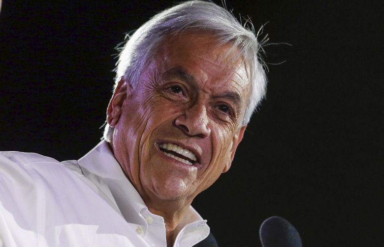 FILE – Sebastian Pinera, former Chilean president who is running again for office, addresses supporters at his closing campaign rally in Santiago, Chile, Nov. 16, 2017. Piñera died on Tuesday, Feb. 6, 2024 in a helicopter crash in Lago Ranco, Chile, according to Chilean Interior Minister Carolina Tohá who announced it on live TV. (AP Photo/Luis Hidalgo, File) XLAT109 XLAT109
