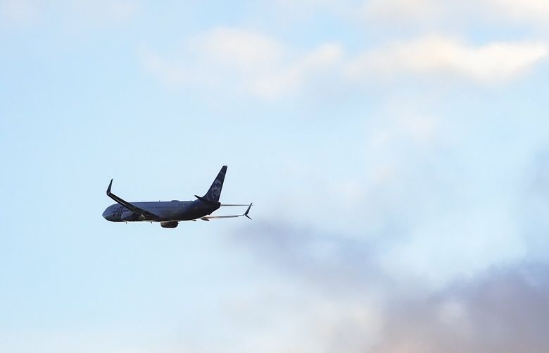 An Alaska Airlines aircraft departs Seattle-Tacoma International Airport Wednesday, Jan. 10, 2024, in SeaTac, Wash. On a Jan. 5 Alaska Airlines flight, a panel used to plug an area reserved for an exit door on a Boeing 737 Max 9 blew open midair, forcing it to return to Portland. (AP Photo/Lindsey Wasson)