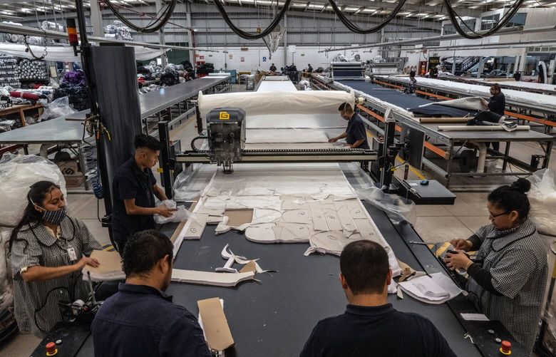 FILE – Workers at Preslow, a fourth-generation apparel business, in Tizayuca, a small manufacturing town about an hour northeast of Mexico City, on Nov. 30, 2022. The United States bought more goods from Mexico than China in 2023 for the first time in 20 years, evidence of how much global trade patterns have shifted.  (Bryan Denton/The New York Times)