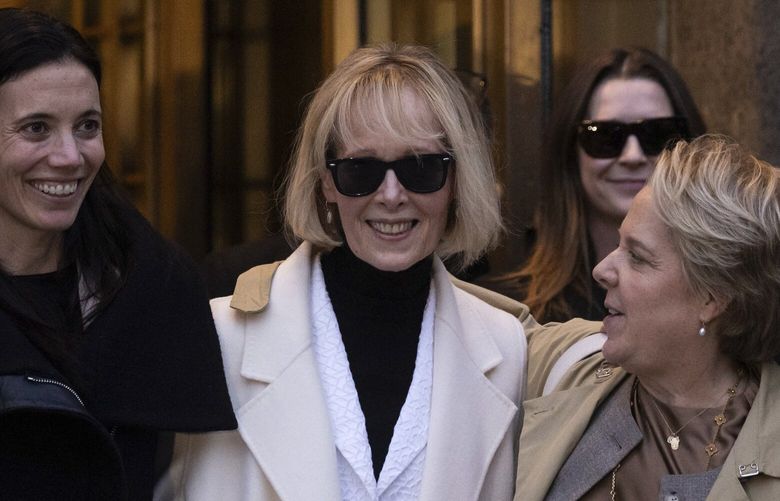 FILE – E. Jean Carroll leaves Federal court, Friday, Jan 26, 2024, in New York. The federal judge who presided over the jury trial that resulted in an $83 million award to Carroll for her defamation claims against former President Donald Trump said Wednesday, Feb. 7, 2024, that his rejection of his lawyer’s unusual midtrial mistrial request was not a close call. (AP Photo/Yuki Iwamura, File) NYWS309 NYWS309