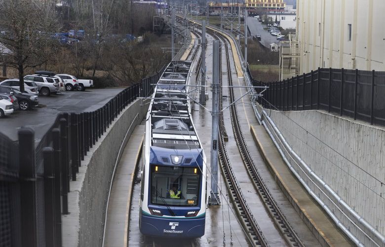A link light rail train heads towards the Spring District station in Bellevue Tuesday, February 6, 2024.  

Sound Transit link light rail test trains are running between Redmond Technology Station and South Bellevue Station in Bellevue.  Full speed practice tests, called “simulated revenue service,” just began.  Shot Tuesday, February 6 2024.

 226075