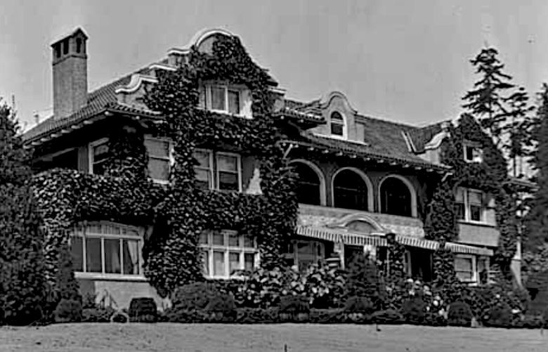 THEN 1: The stucco walls of Loch Kelden are covered with ornamental ivy in this 1926 photo, the only extant view from its early decades. Its three stories and 7,700 square feet stood on a 50-acre waterfront estate, encircled on three sides by virgin timber. “It boggles my mind,” says Eugenia Woo of Historic Seattle, “that anyone would acquire the historic Rolland Denny Mansion property as a multimillion-dollar teardown.”