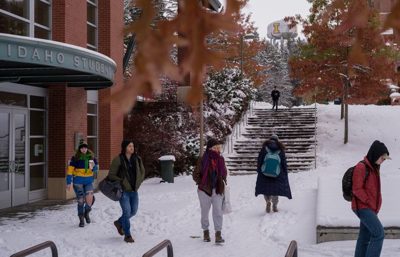 FILE — Students walking between classes at the University of Idaho, in Moscow, Idaho on Nov. 30, 2022. The state will ban student ID cards as a form of voter identification, one of few successes for Republicans targeting young voters this year. (Rajah Bose/The New York Times)