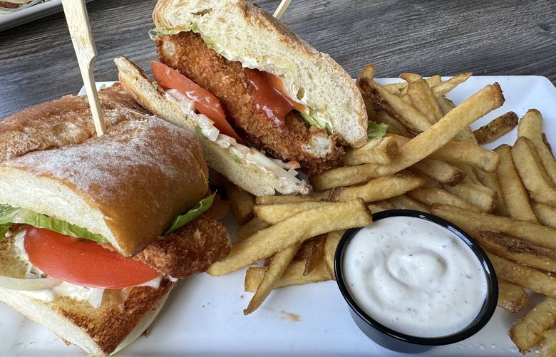 Although the po’boy sandwich at Andy’s Fish House isn’t traditional due to generous swathes of cocktail and tartar sauces, it makes for a delicious sandwich.