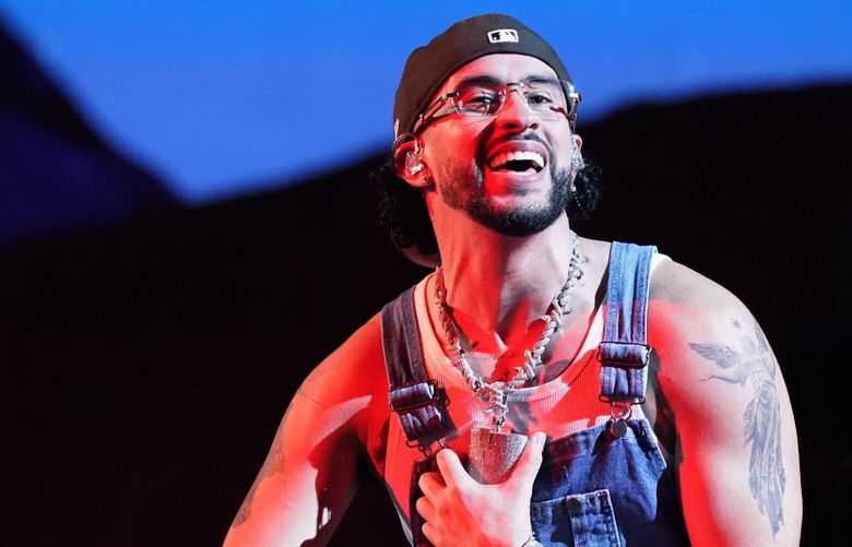 FILE – Bad Bunny performs at the Latin Billboard Awards in Coral Gables, Fla., on Oct. 5, 2023. Bad Bunny’s “Monaco” was named one of the top songs of the year by The Associated Press.  (AP Photo/Marta Lavandier, File) NYET812