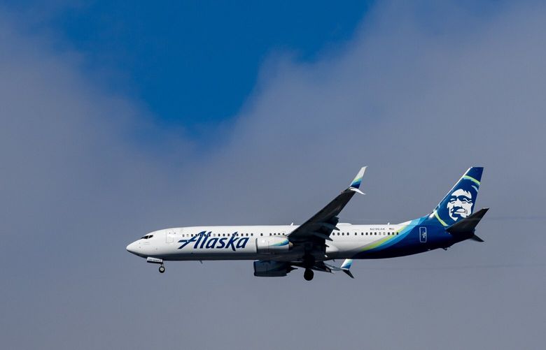 An Alaska Airlines Boeing 737-900 comes in for a landing at Sea-Tac Airport Saturday, July 22, 2023.  224544