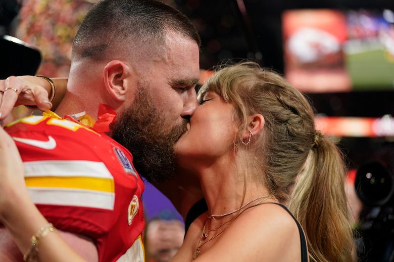 Travis Kelce brings home the hardware, holds up 'end of the bargain' with  Taylor Swift | The Seattle Times