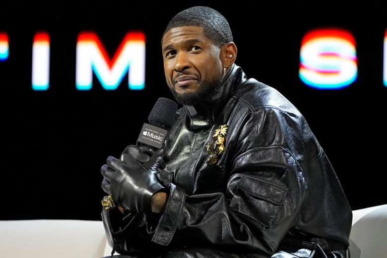 Usher speaks during a news conference ahead of the Super Bowl 58 NFL football game Thursday, Feb. 8, 2024, in Las Vegas. Usher will perform during the Super Bowl halftime show. (AP Photo/John Locher)