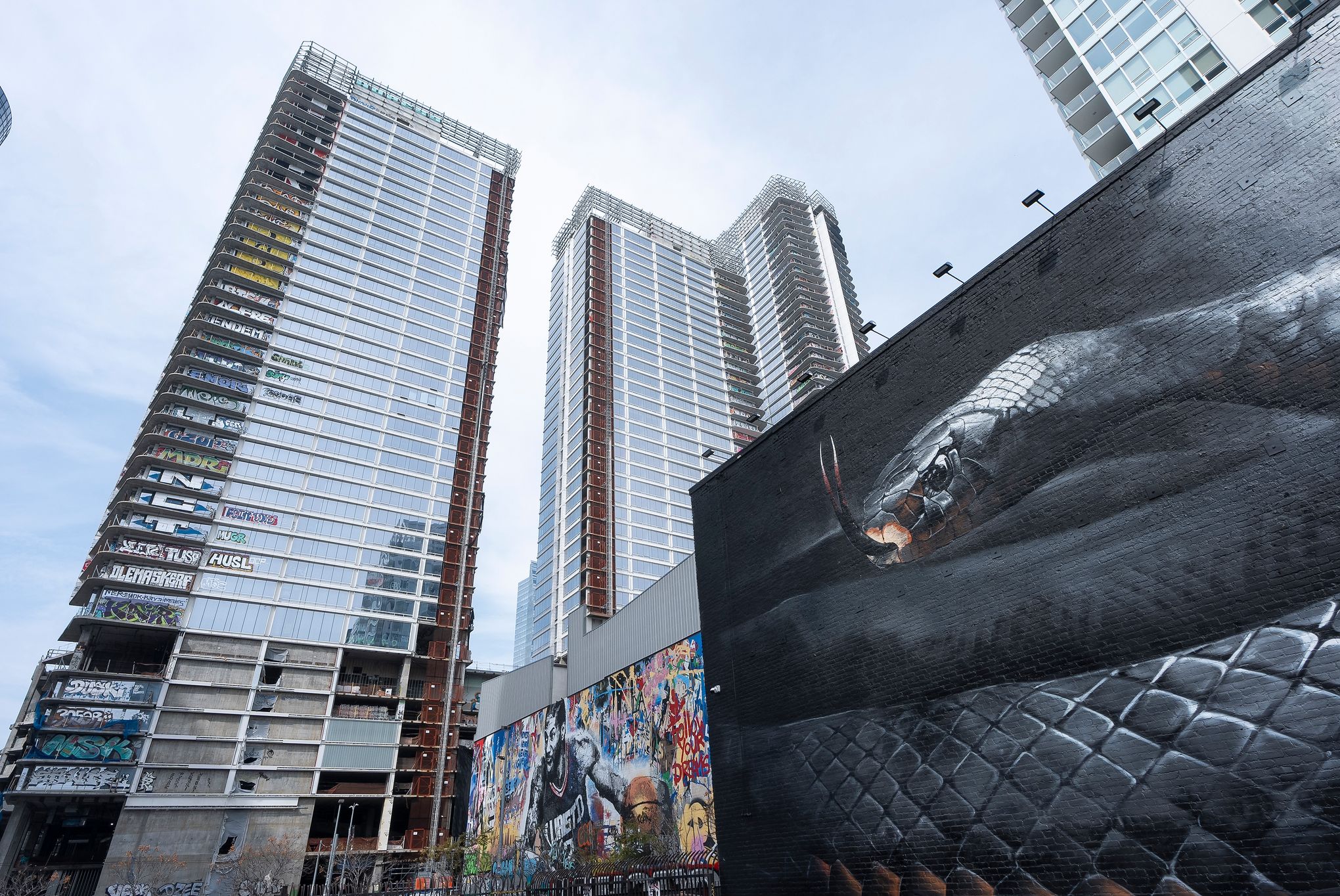 Crews move to secure graffiti-scarred Los Angeles towers left unfinished |  The Seattle Times