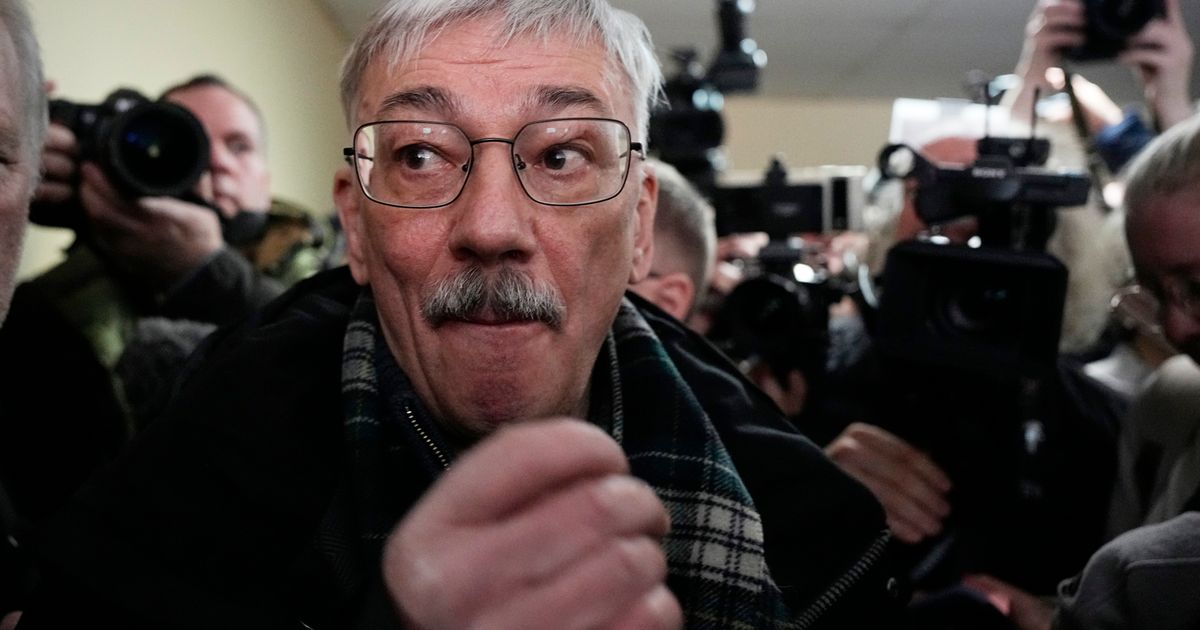 A Russian court sentences the co-chair of a Nobel-winning rights group to 30 months in prison