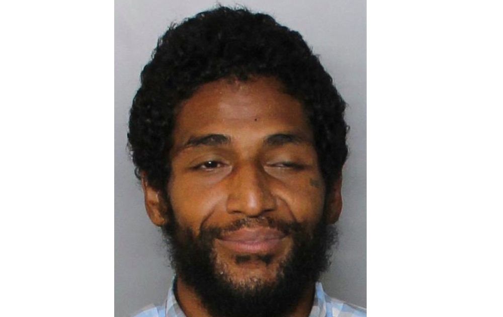 A sniper killed a Florida bank robber as he held a knife to a hostage’s throat