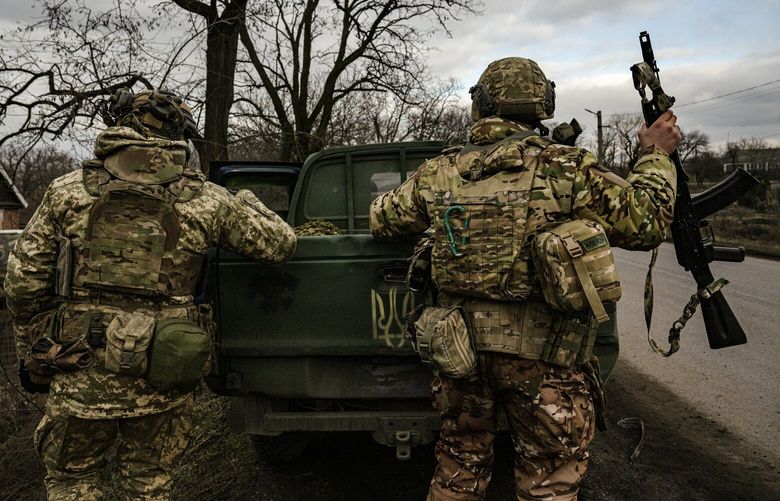 Ukrainian soldiers prepare to move out from a village west of Avdiivka, in the Donbas region of eastern Ukraine on Feb. 20, 2024. The capture of Avdiivka was the Russians’ most significant gain in nine months and a blow to Ukrainian forces struggling with shortages of ammunition and men. (Lynsey Addario/The New York Times) — NO SALES — XNYT0459 XNYT0459
