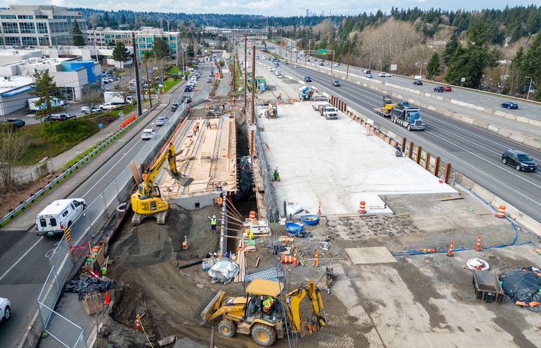 Construction work continues on a culvert replacement for Sunset Creek in Bellevue, Washington, alongside I-90, Wednesday morning, March 6, 2024. 226335