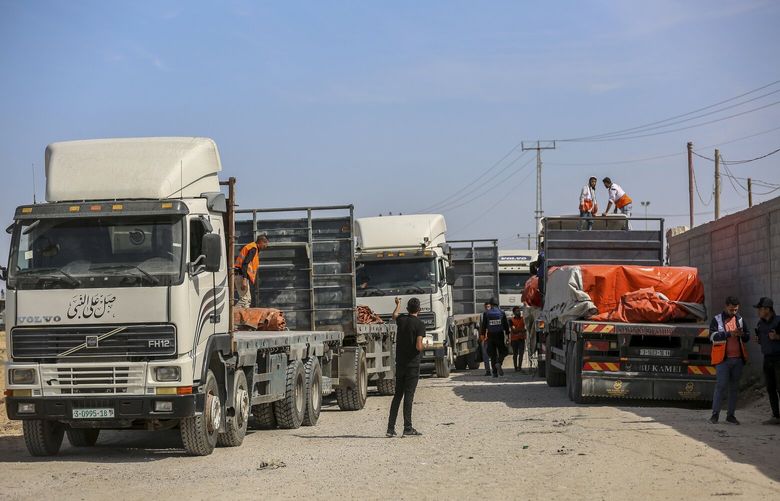 Humanitarian aid arriving through the Rafah crossing into the Gaza Strip, Oct. 21, 2023. The number of trucks entering Gaza with food and other aid rose in early March compared with February, according to data from the United Nations. (Samar Abu Elouf / The New York Times)