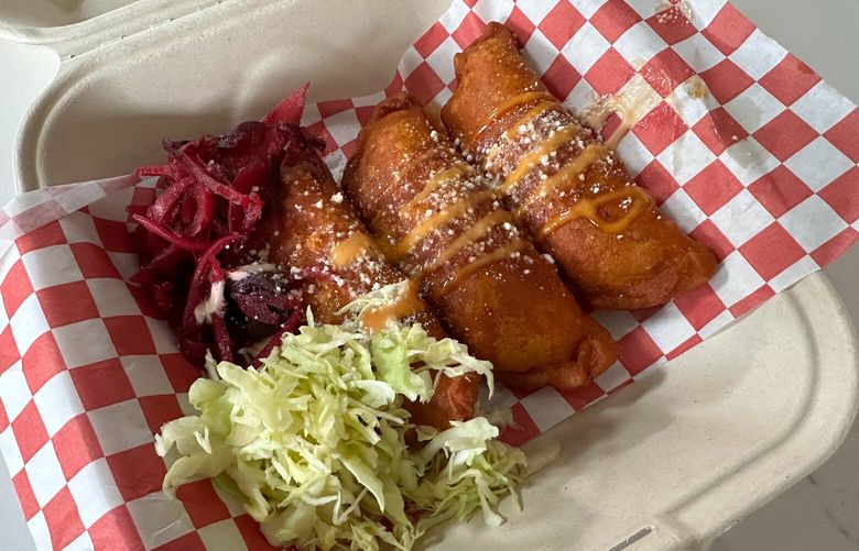 The food truck La Casa de Amigos serves up Honduran food like these pastelitos, a trio of crunchy, fried pastries stuffed with beef or chicken served with sides of spicy curdito and cabbage.