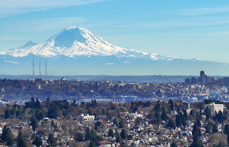 Mount Rainier seen from the Crown Hill neighborhood during a warm and sunny afternoon in Seattle on Saturday, March 16, 2024.  Nice weather is supposed to stick around through the weekend.